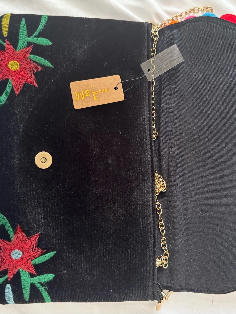 Embroidered Black Clutch with Multicolor Pom-Pom Chain